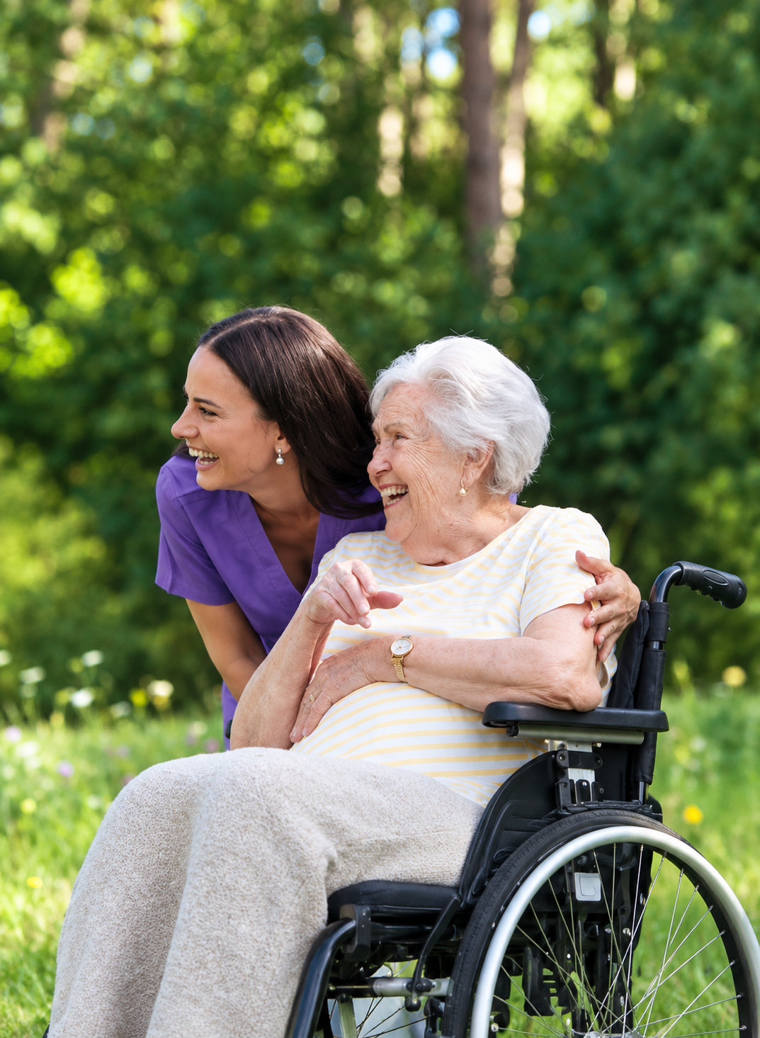 A TrueCourse carer sharing a joyful moment outdoors with an older woman
